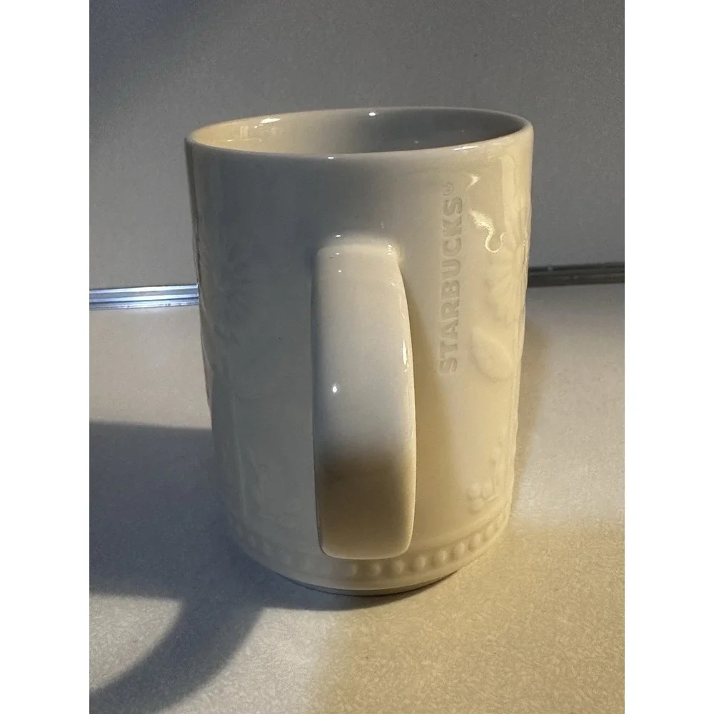 Starbucks Floral SUNFLOWER 12oz Coffee Mug White Embossed Textured Flowers Daisy